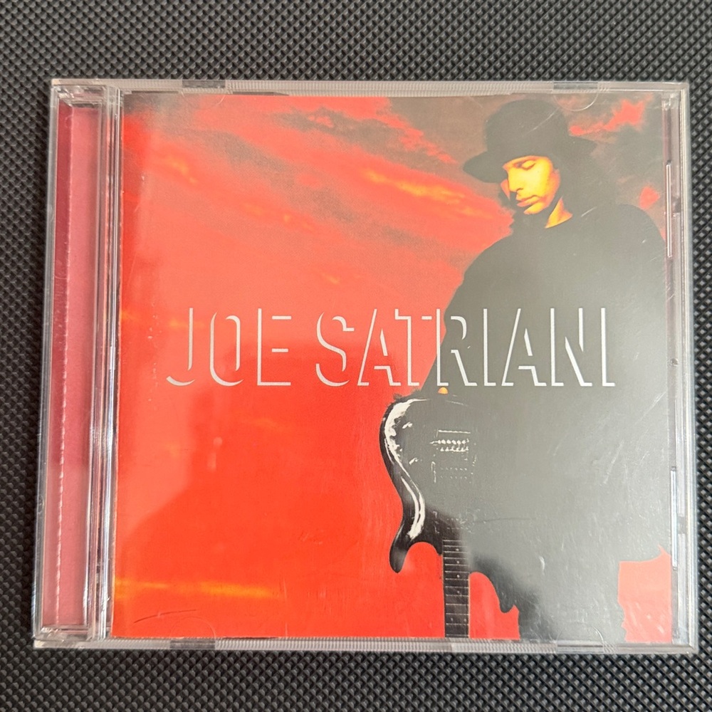 Joe Satriani - self titled by guitarist Joe Satriani
- 6th CD 1995 - used